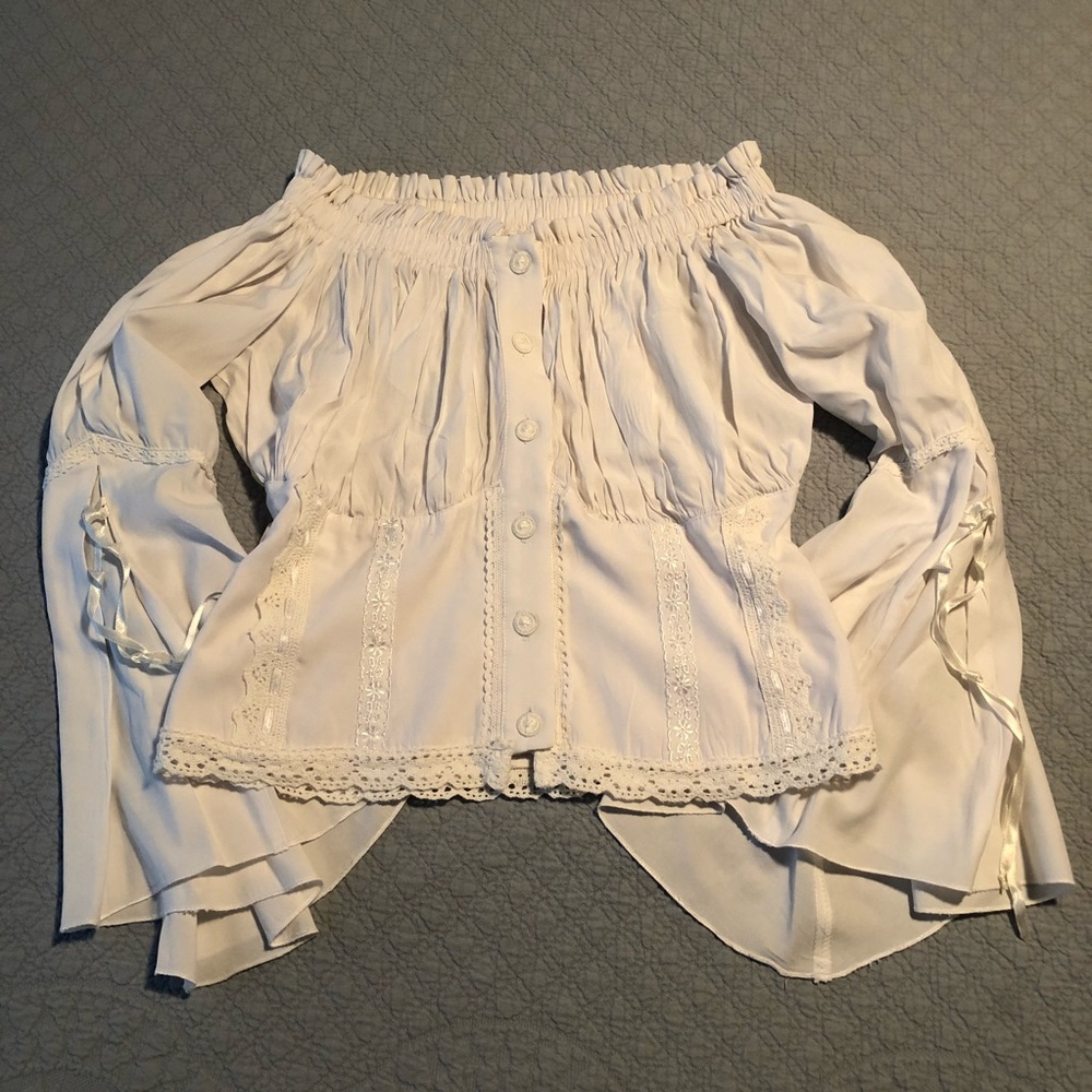 Definitely unique off shoulders blouse!